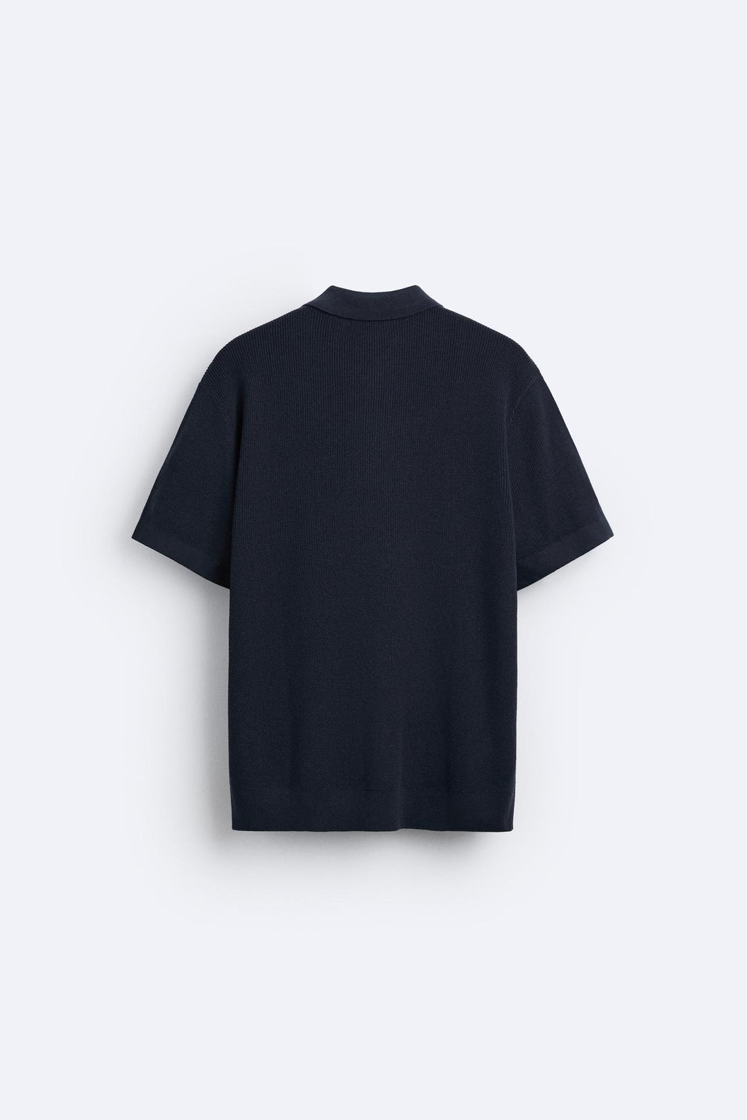 Elegante gebreide polo met rits