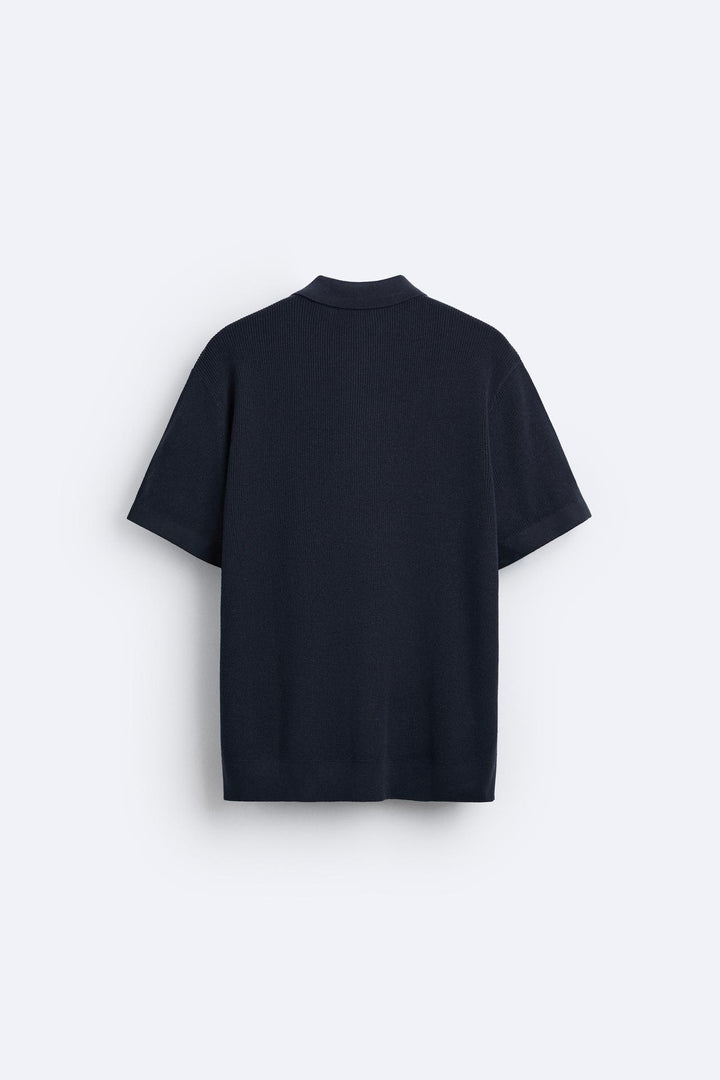 Elegante gebreide polo met rits