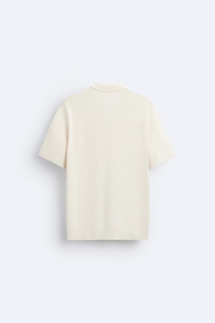 Elegante gebreide polo met rits