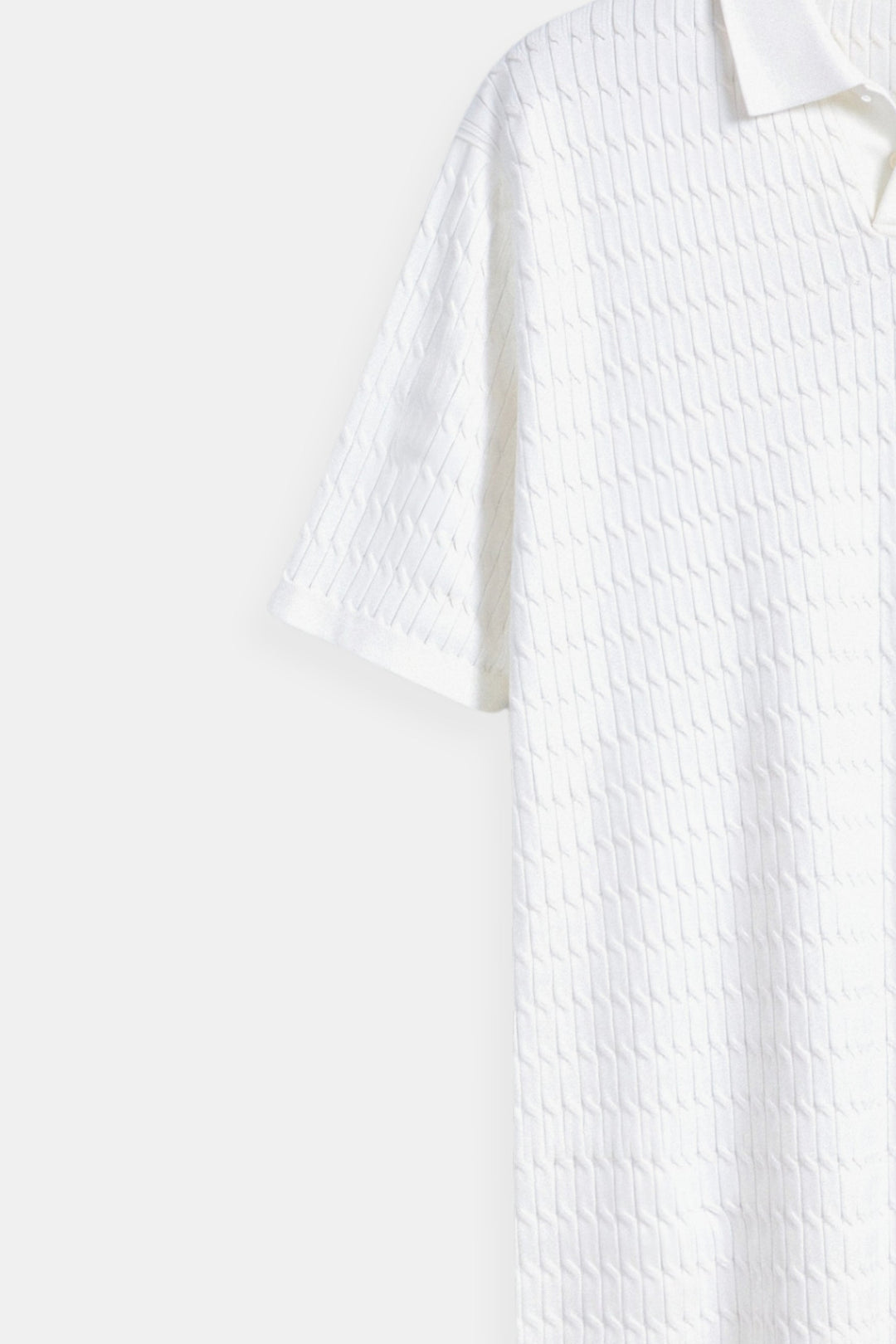 Witte gebreide poloshirt met structuurpatroon