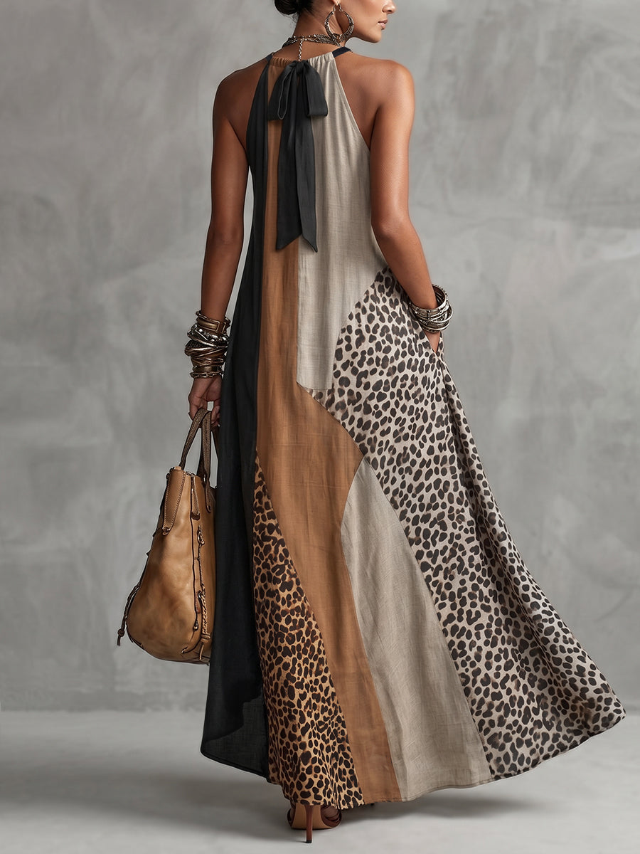 LUCIA | Maxi Halterjurk met Luipaardprint en Asymmetrische Inzetten