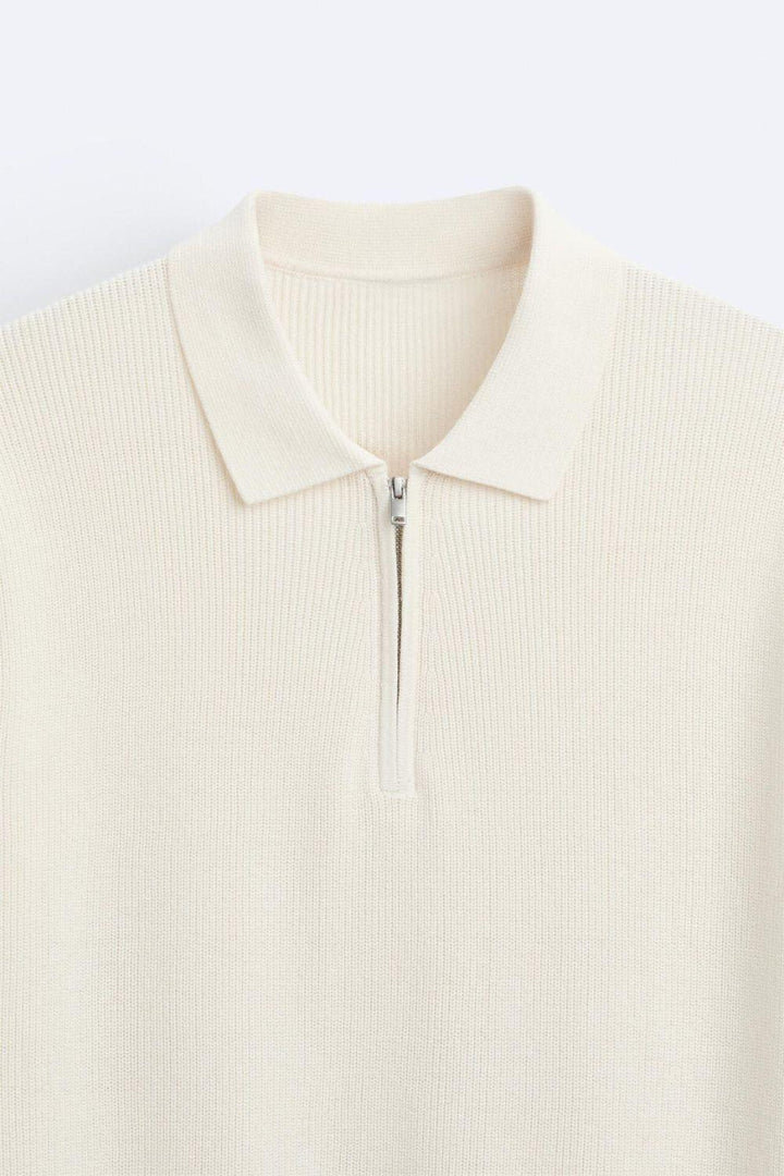 Elegante gebreide polo met rits
