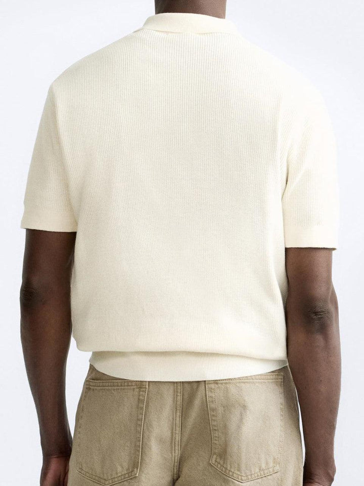 Elegante gebreide polo met rits